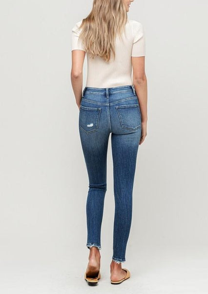 Wave Button Fly Distressed Skinny Jeans