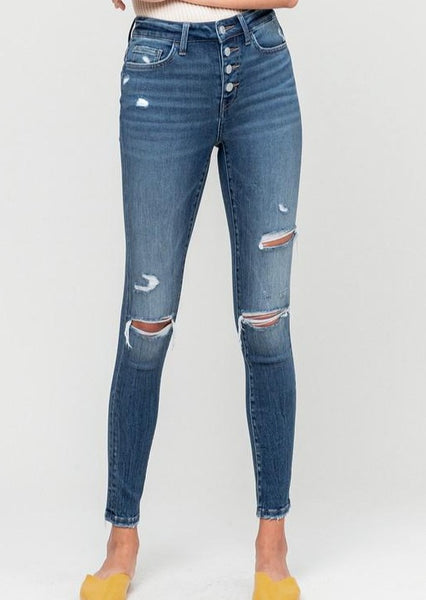 Wave Button Fly Distressed Skinny Jeans