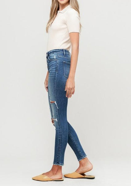Wave Button Fly Distressed Skinny Jeans