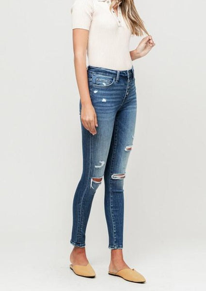 Wave Button Fly Distressed Skinny Jeans